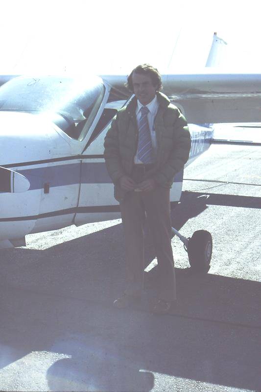 Rick Arnold beside a Cessna Cardinal RG, May 1977
