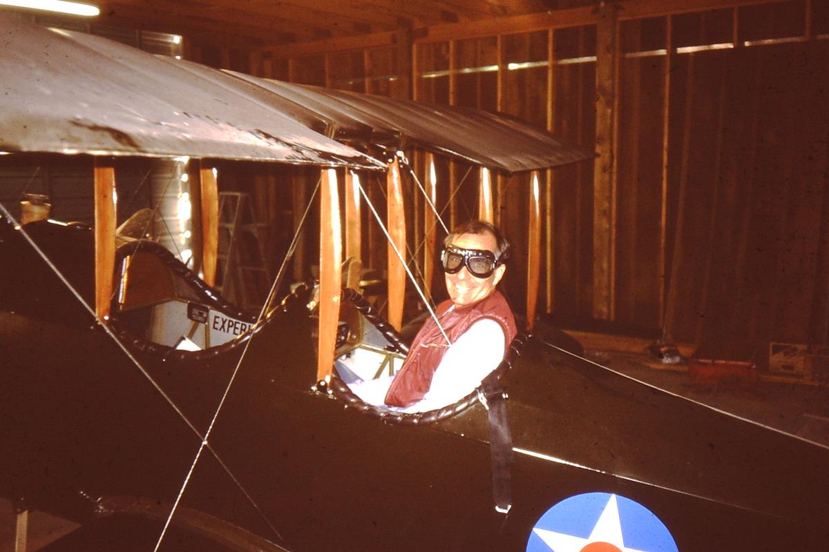 David Barth sitting in a Jenny Replica at Tri-County Airport, January 1992