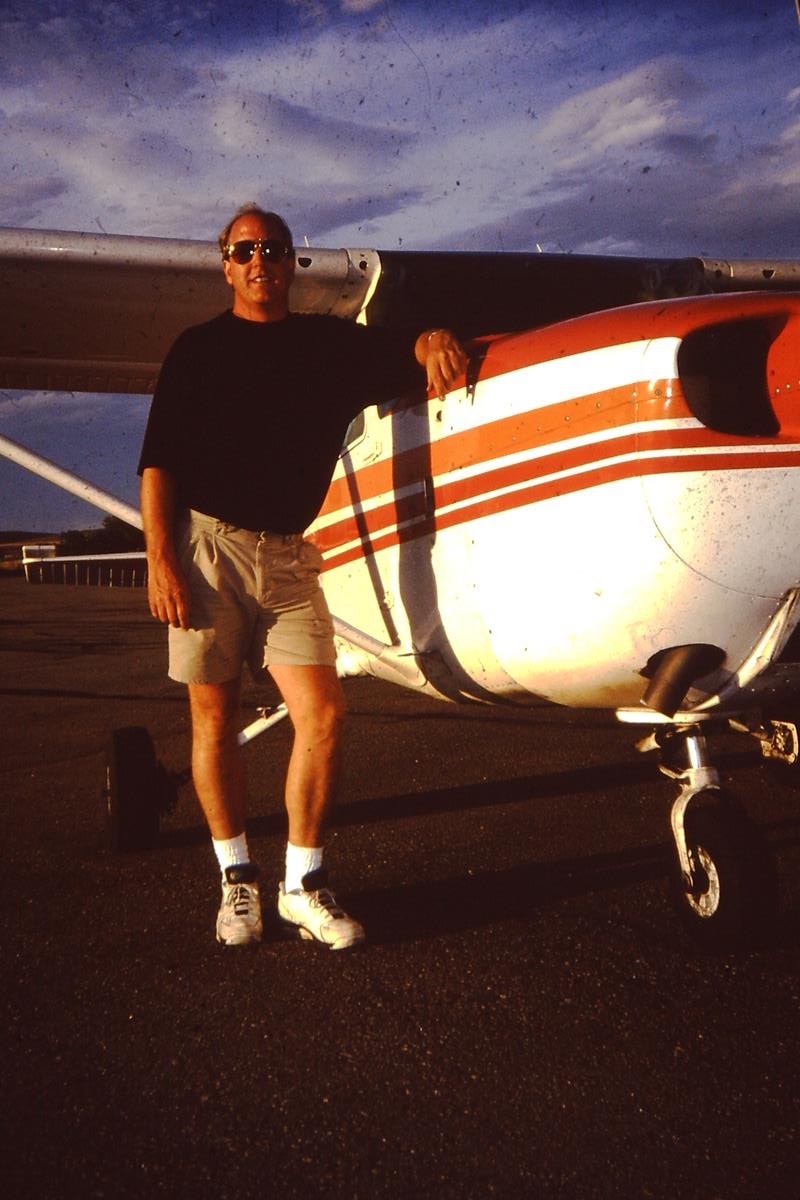 Mike Wilson with Art Wilson's RV6 at Tri-County Airport, July 1994