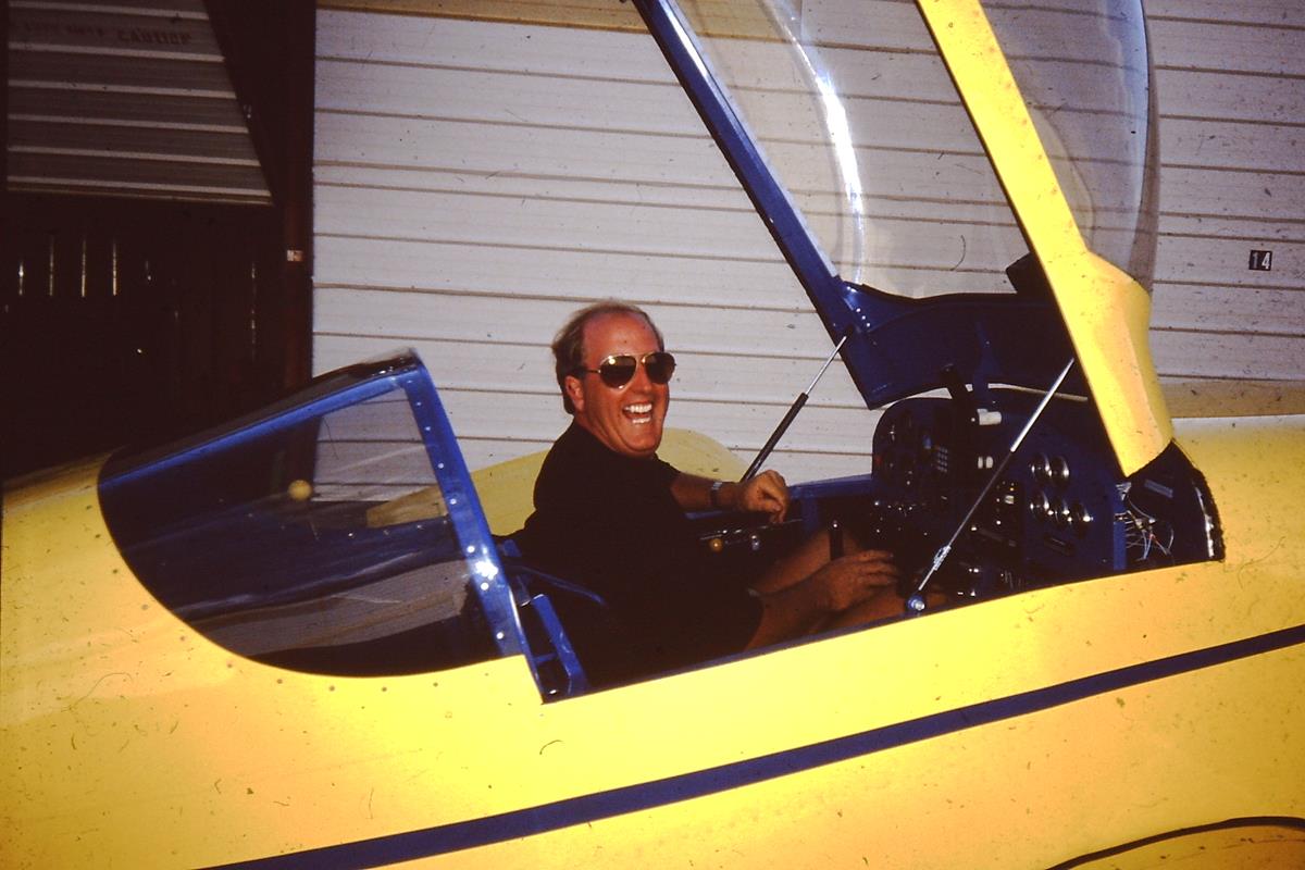 Mike Wilson with Art Wilson's RV6 at Tri-County Airport, July 1994