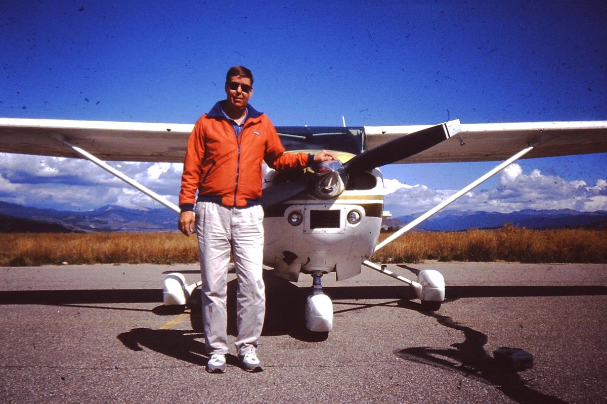 Gary Aho with Greg Boom's Cessna 182 in Granby, Colorado, October 1994