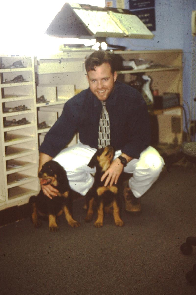 Air West Flying Club Instructor with two Rotweiler pups, March 1997